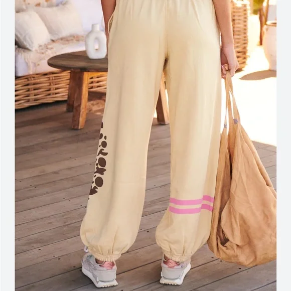 Free People Movement All Star Logo Pants in a cream color. - Picture 6 of 9